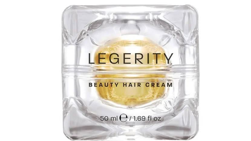 Bote de cristal transparente modelado y contenido de crema Legerity Beauty Hair Cream